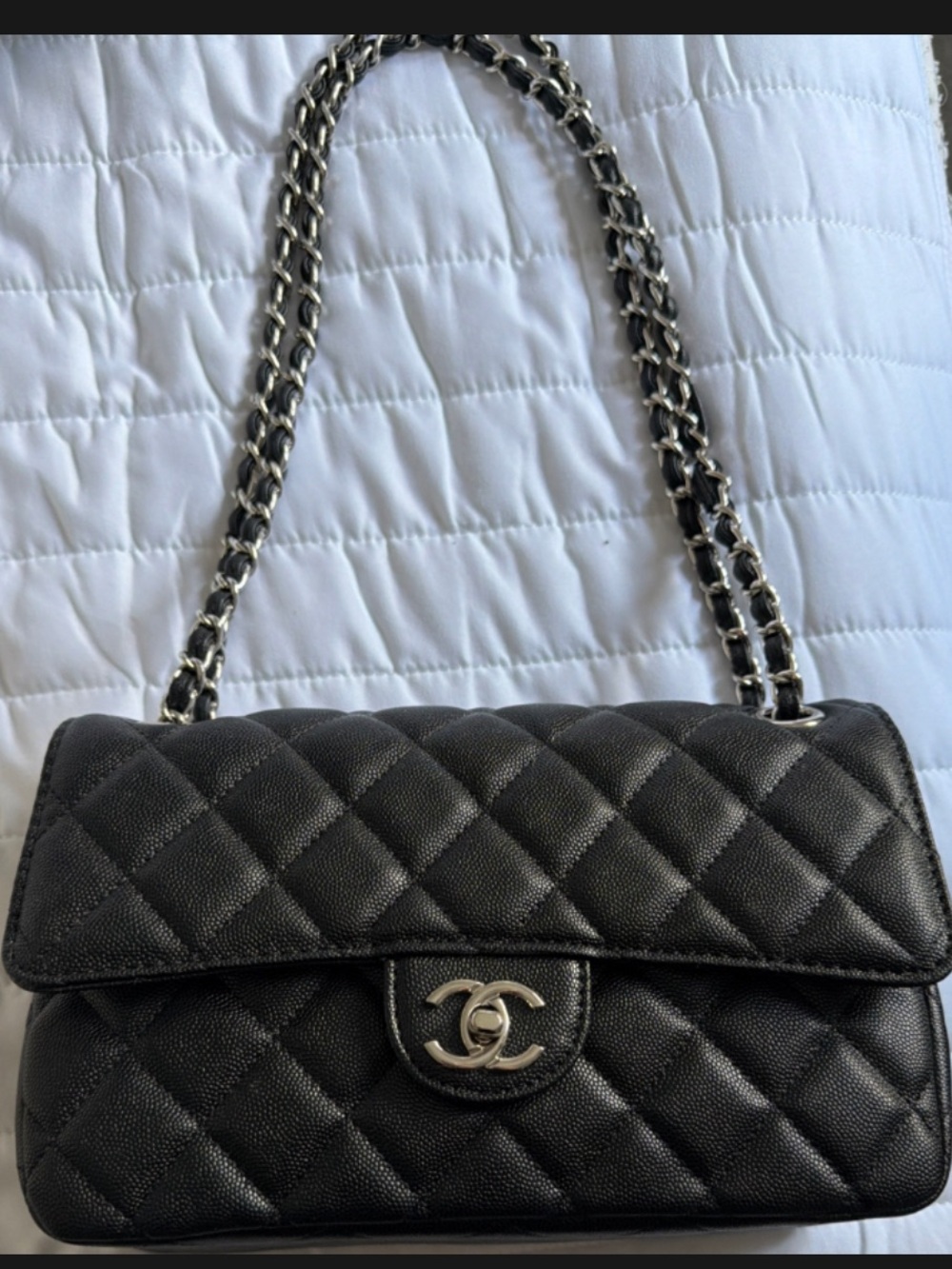 Black caviar bag